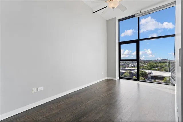 a view of a small space with wooden floor