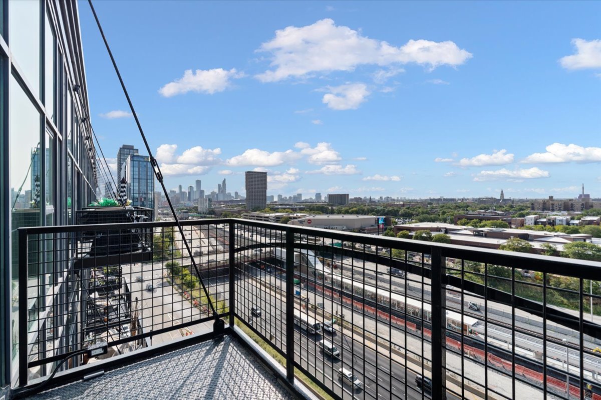 1224 West Van Buren Street, Unit 809 Chicago, IL 60607 - Photo 9 of 25 a view of city from a balcony