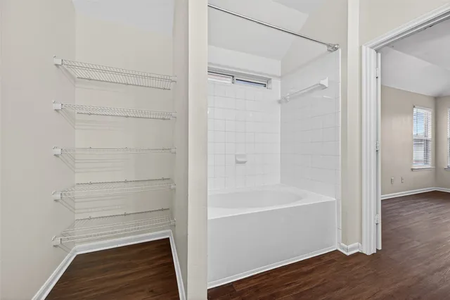 a bathroom with a bathtub