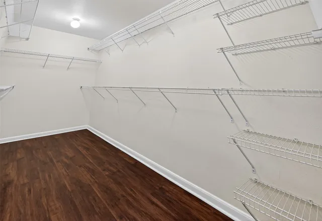 a view of a room with racks on the wall