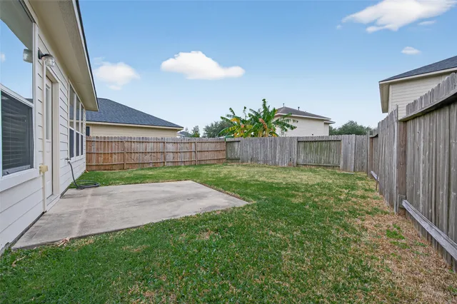 a view of a backyard with a garden