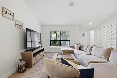 a view of a livingroom with furniture and wooden floor