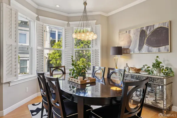 a kitchen with stainless steel appliances granite countertop a stove refrigerator sink and cabinets