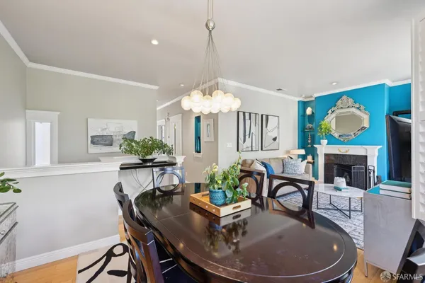 a kitchen with appliances a sink and cabinets