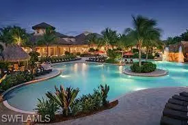 a view of a swimming pool with a garden