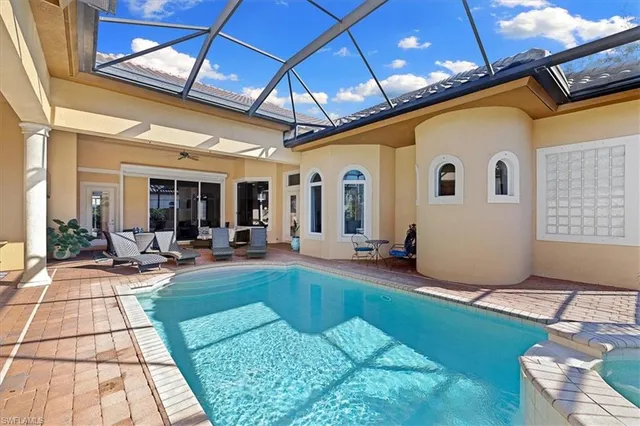 a view of a backyard with sitting area