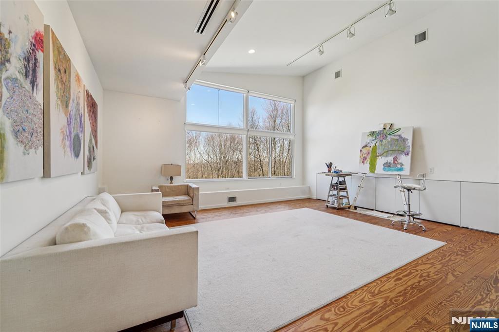 71 Sally Harden Road Sussex, NJ 07461 - Photo 21 of 33 a living room with furniture and a large window