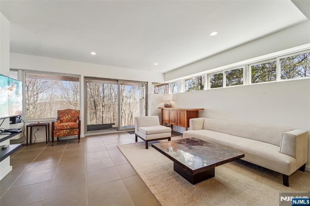 71 Sally Harden Road Sussex, NJ 07461 - Photo 25 of 33 a living room with furniture and large windows