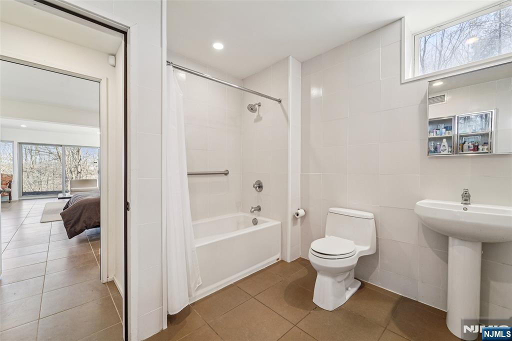 71 Sally Harden Road Sussex, NJ 07461 - Photo 27 of 33 a bathroom with a sink toilet and shower