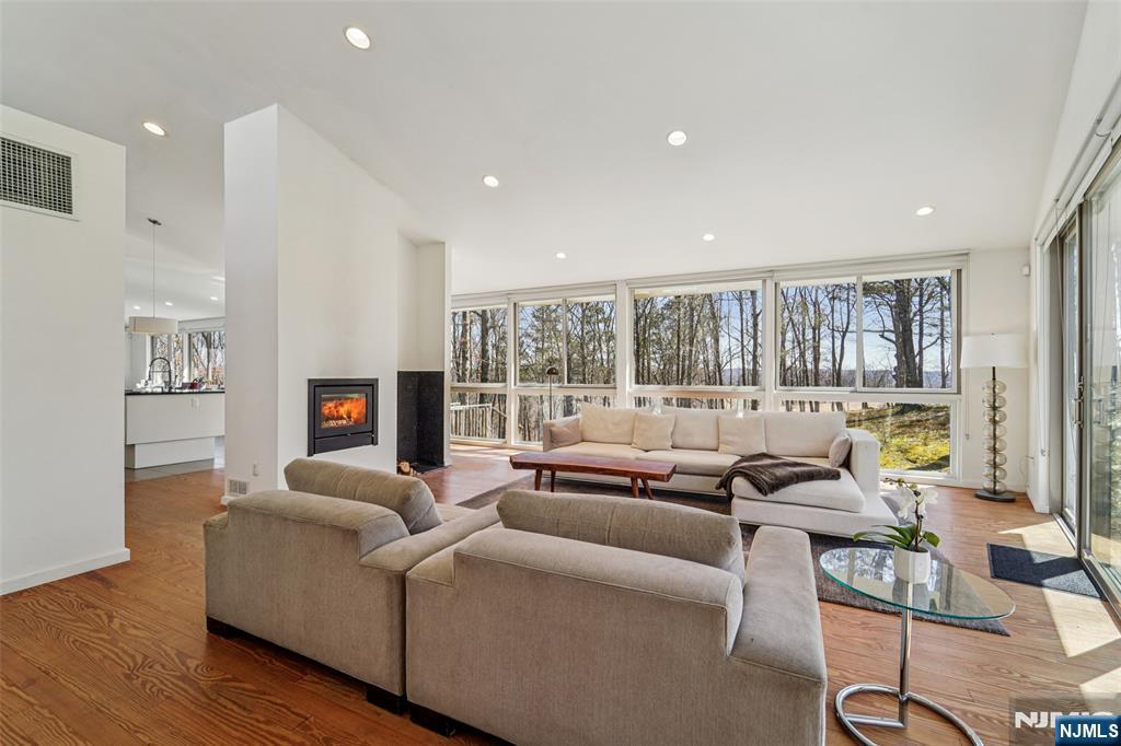 71 Sally Harden Road Sussex, NJ 07461 - Photo 9 of 33 a living room with furniture and a fireplace