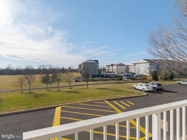a view of a swimming pool with a chairs