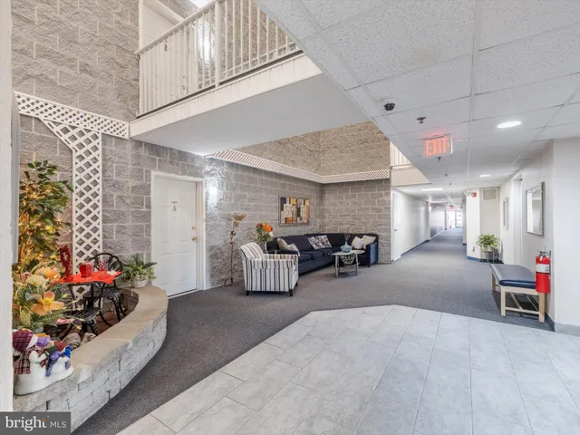 a view of a livingroom with furniture