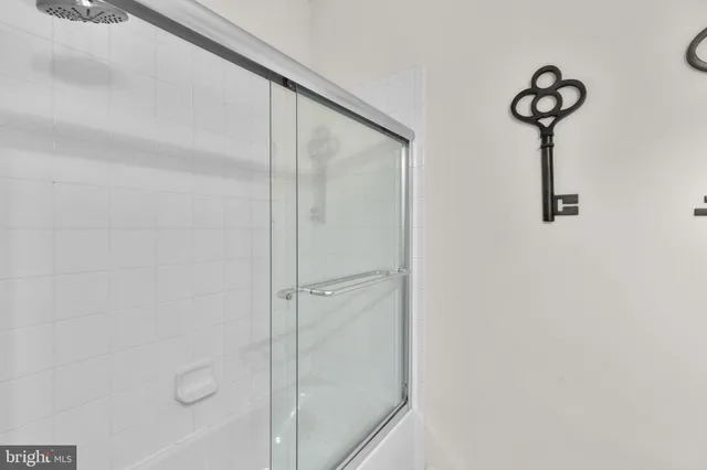 an aerial view of residential house with outdoor space and swimming pool