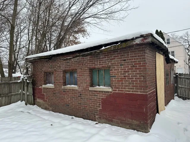 a front view of a house with garage