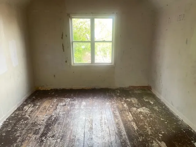an empty room with a window