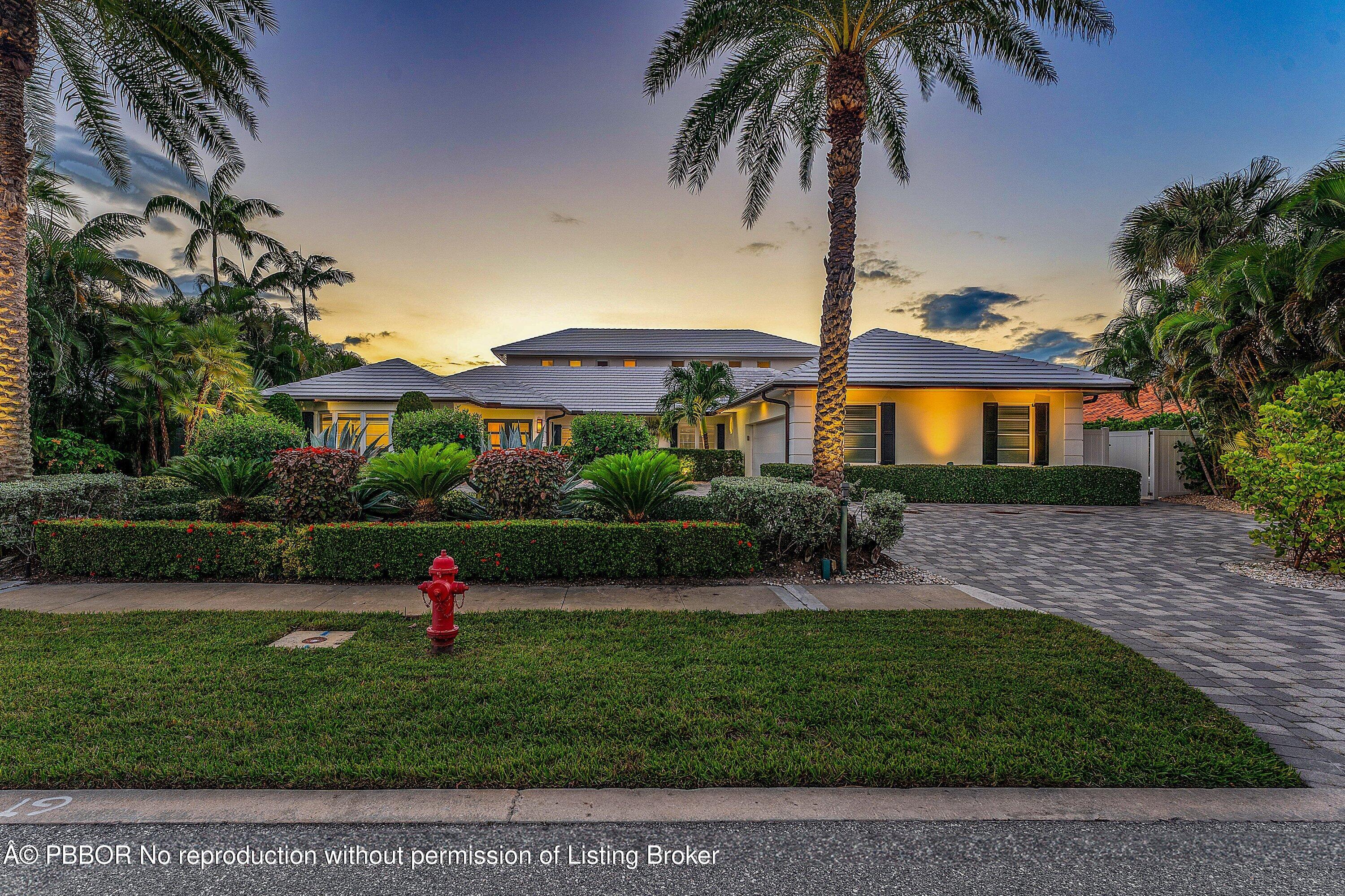 50 Spoonbill Road Lantana, FL 33462 - Photo 6 of 37 a front view of a house with garden