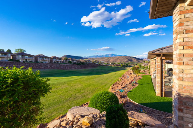 2212 Chippenham Court St. George, UT 84770 - Photo 31 of 75 View of grassy yard with a mountain view