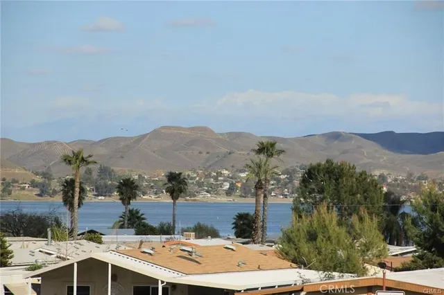 an aerial view of residential house and mountain view