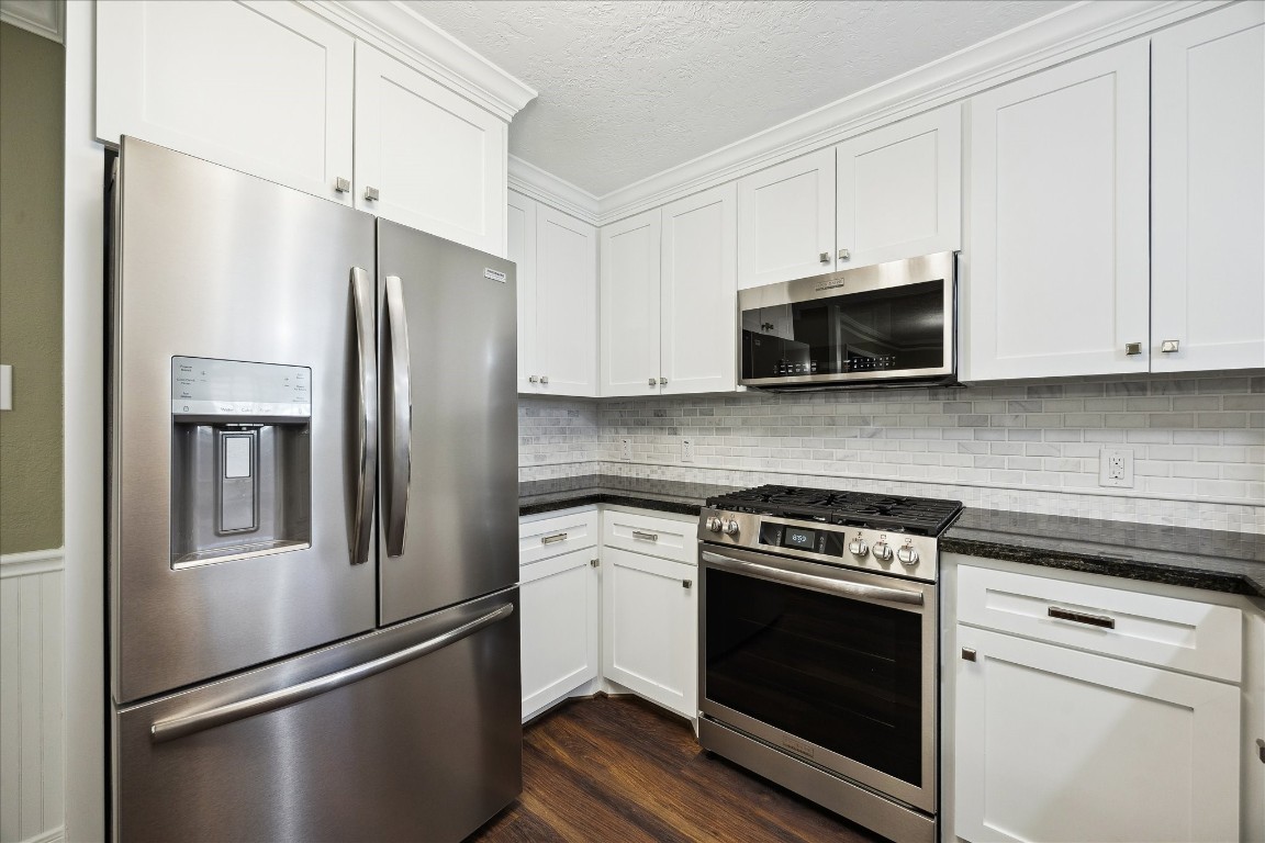 1115 Post Street Houston, TX 77022 - Photo 9 of 23 All new stainless steel appliances.