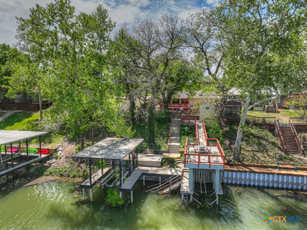 1015 Reiley Road Seguin, TX 78155 - Photo 40 of 45 a view of swimming pool with lawn chairs and plants
