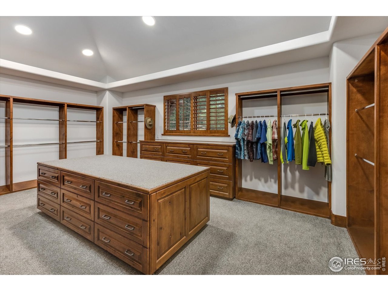 34750 Fox Ridge Road Evergreen, CO 80439 - Photo 31 of 39 Huge master closet to keep all four season's clothing in order. Never lose a piece of clothing again.