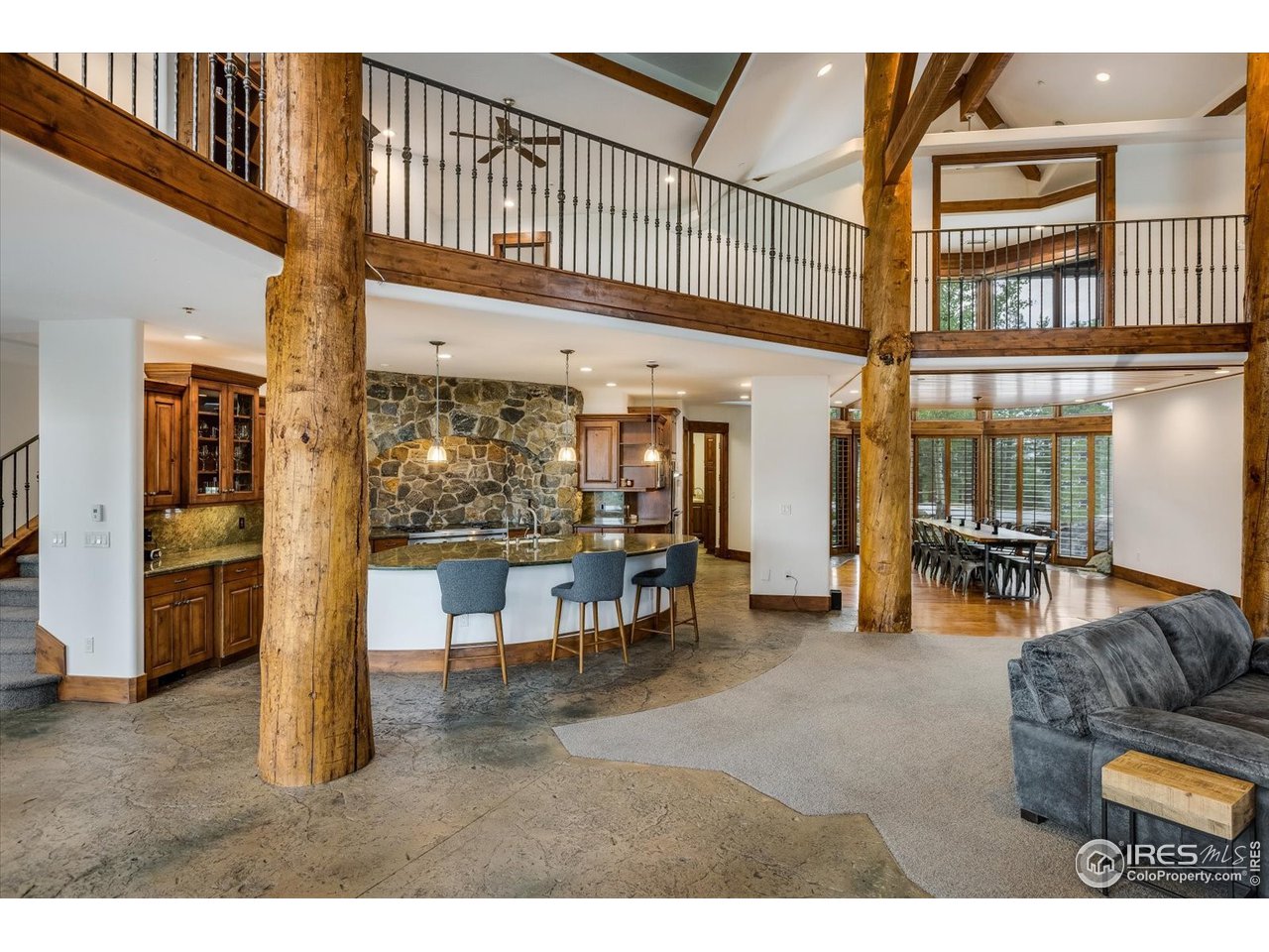34750 Fox Ridge Road Evergreen, CO 80439 - Photo 32 of 39 Concrete, wood, and New Zealand Highlands' wool carpeting throughout