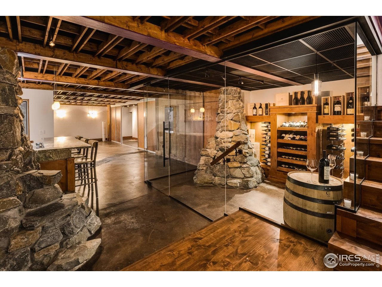 34750 Fox Ridge Road Evergreen, CO 80439 - Photo 4 of 39 Temp controlled wine tasting room, enclosed by custom 1/2" glass walls.