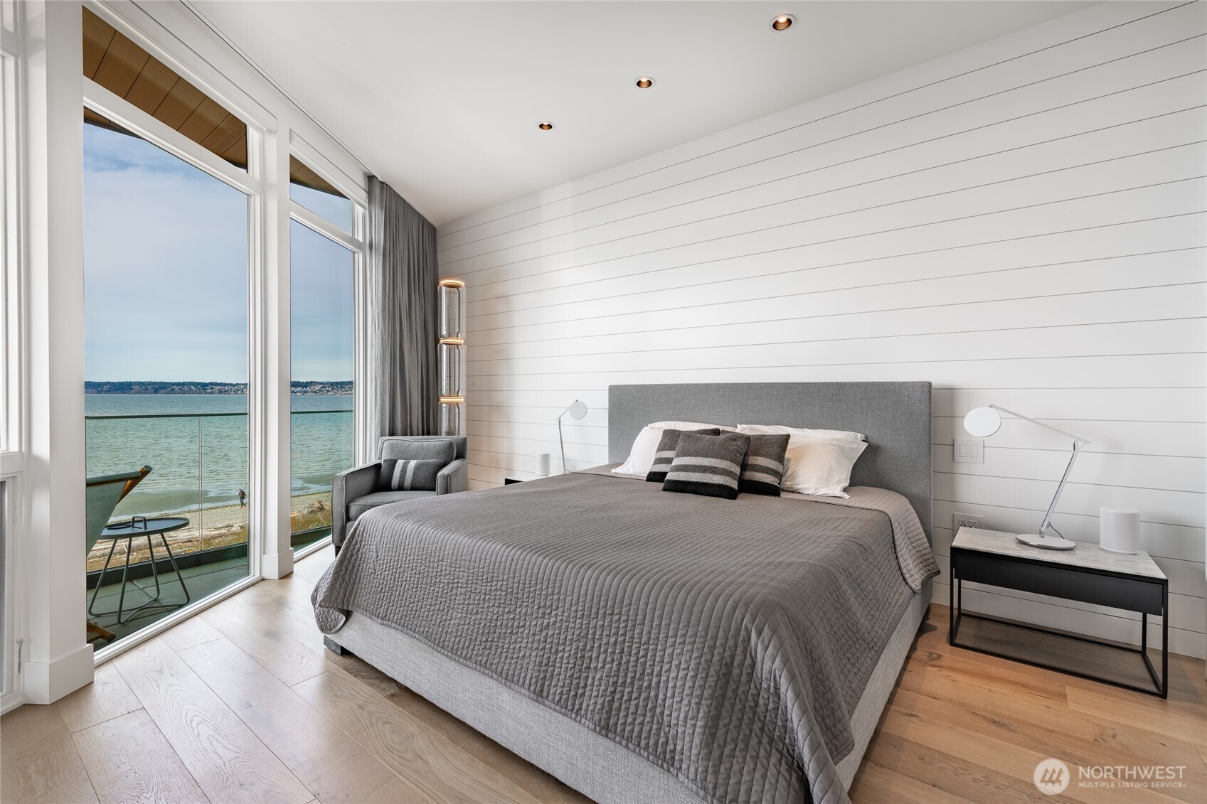 9545 Semiahmoo Parkway, Unit 201 Blaine, WA 98230 - Photo 17 of 40 a bedroom with a bed and a large window