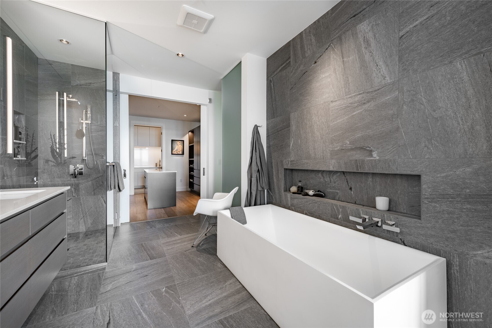 9545 Semiahmoo Parkway, Unit 201 Blaine, WA 98230 - Photo 19 of 40 a large bathroom with a double vanity sink a mirror and a shower