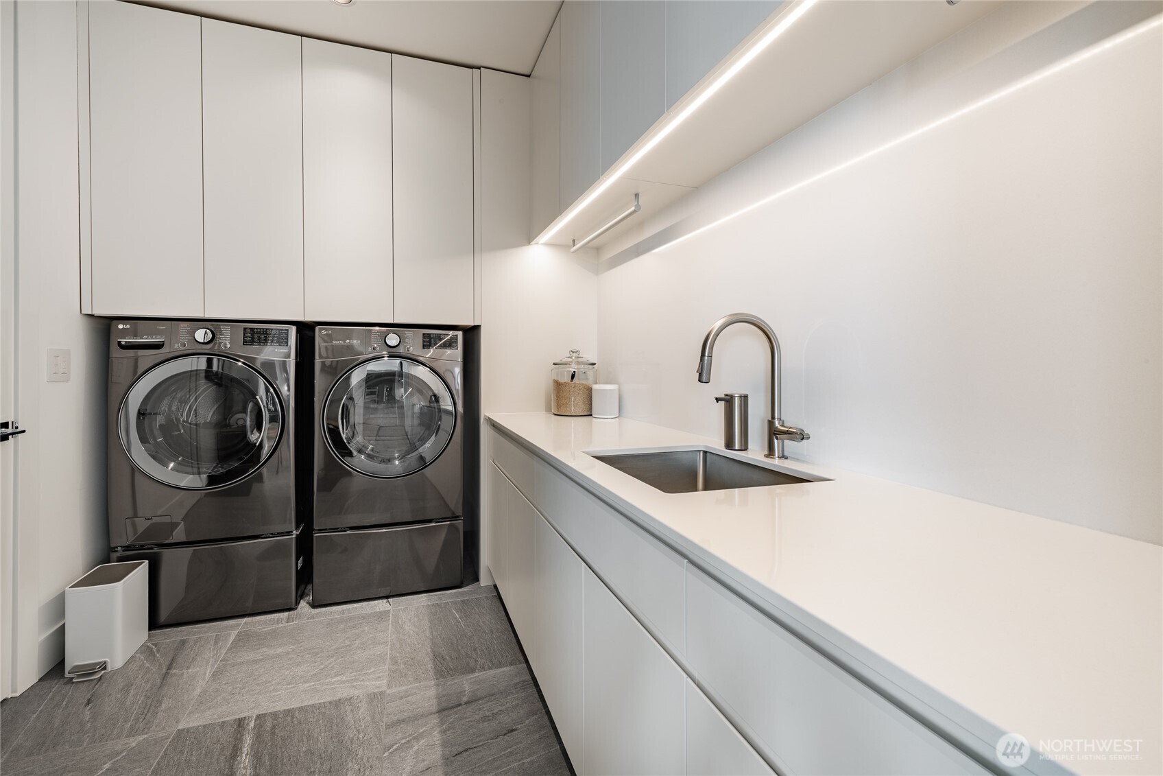 9545 Semiahmoo Parkway, Unit 201 Blaine, WA 98230 - Photo 24 of 40 a utility room with dryer and washer