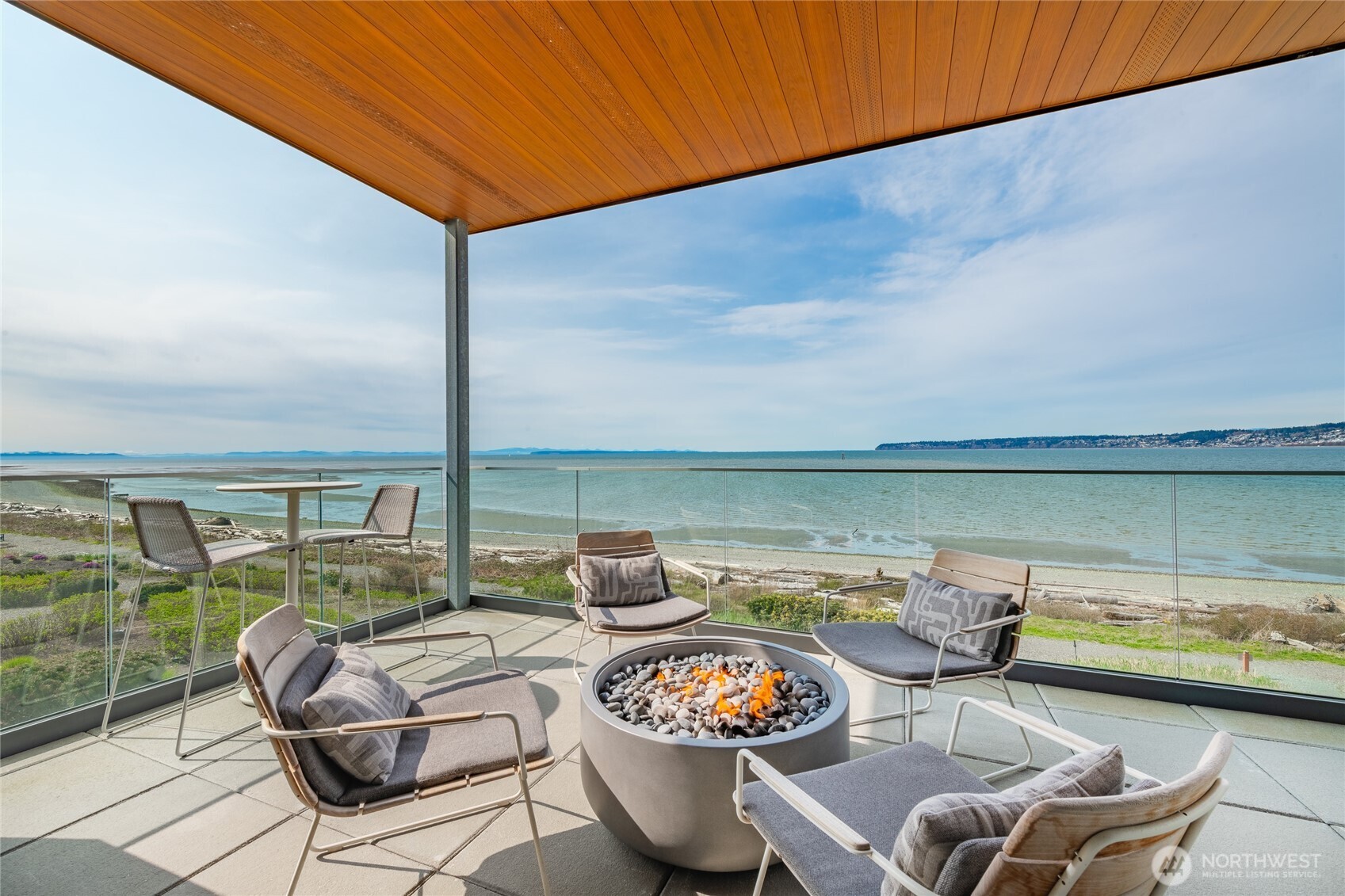 9545 Semiahmoo Parkway, Unit 201 Blaine, WA 98230 - Photo 26 of 40 a living room with furniture and a table