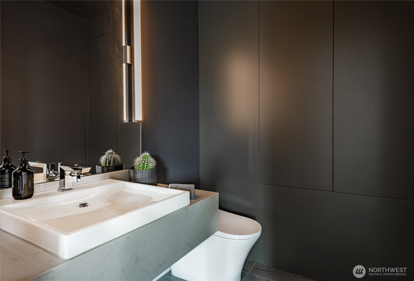 9545 Semiahmoo Parkway, Unit 201 Blaine, WA 98230 - Photo 30 of 40 a bathroom with a sink and a toilet