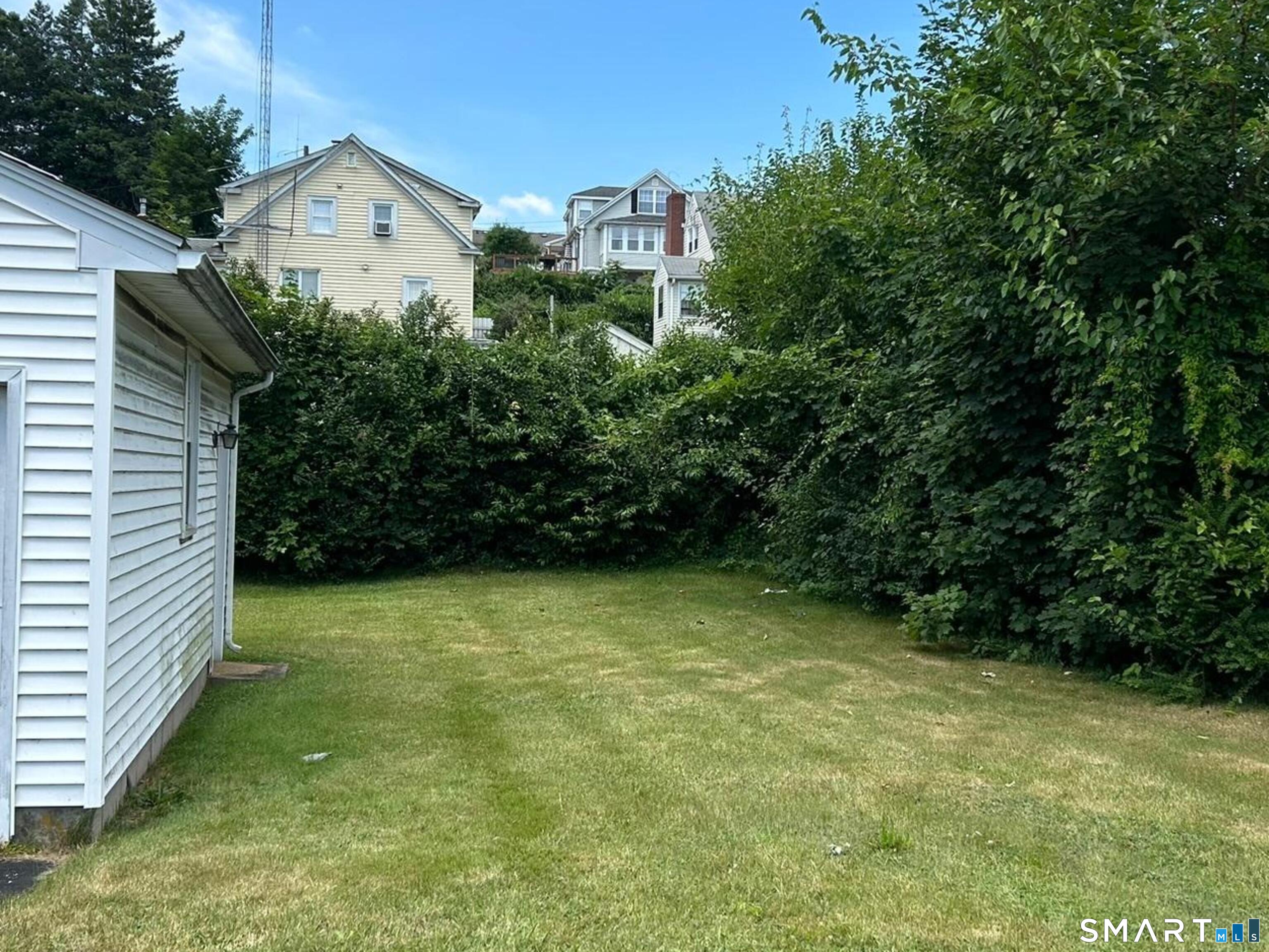 38 Beecher Street Southington, CT 06489 - Photo 12 of 12 a view of a house with a outdoor space