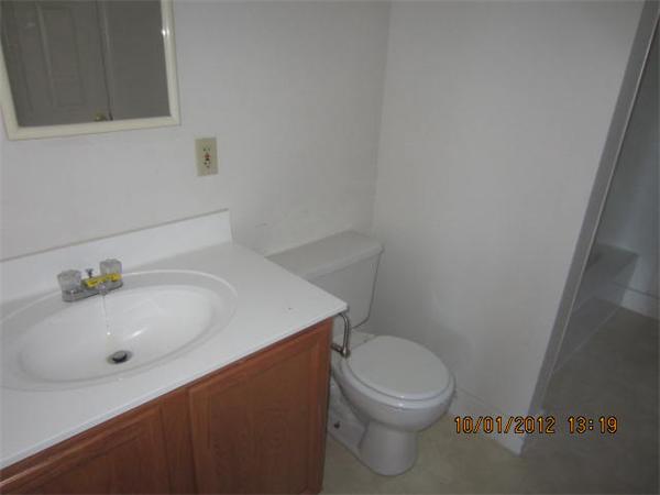 177 Nashua Street, Unit 5 Fall River, MA 02721 - Photo 14 of 15 a bathroom with a sink a toilet and bathtub