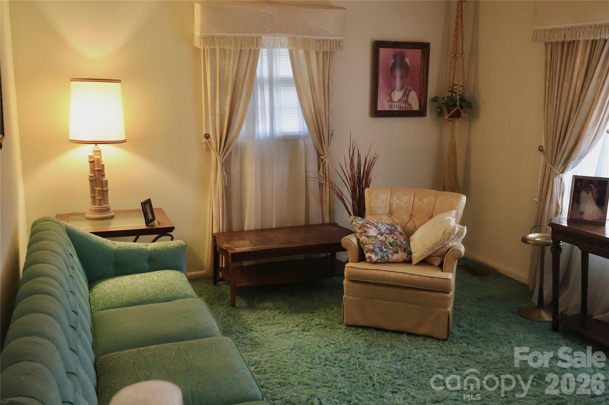 1529 West Market St Extension Cheraw, SC 29520 - Photo 12 of 38 a living room with furniture and a lamp