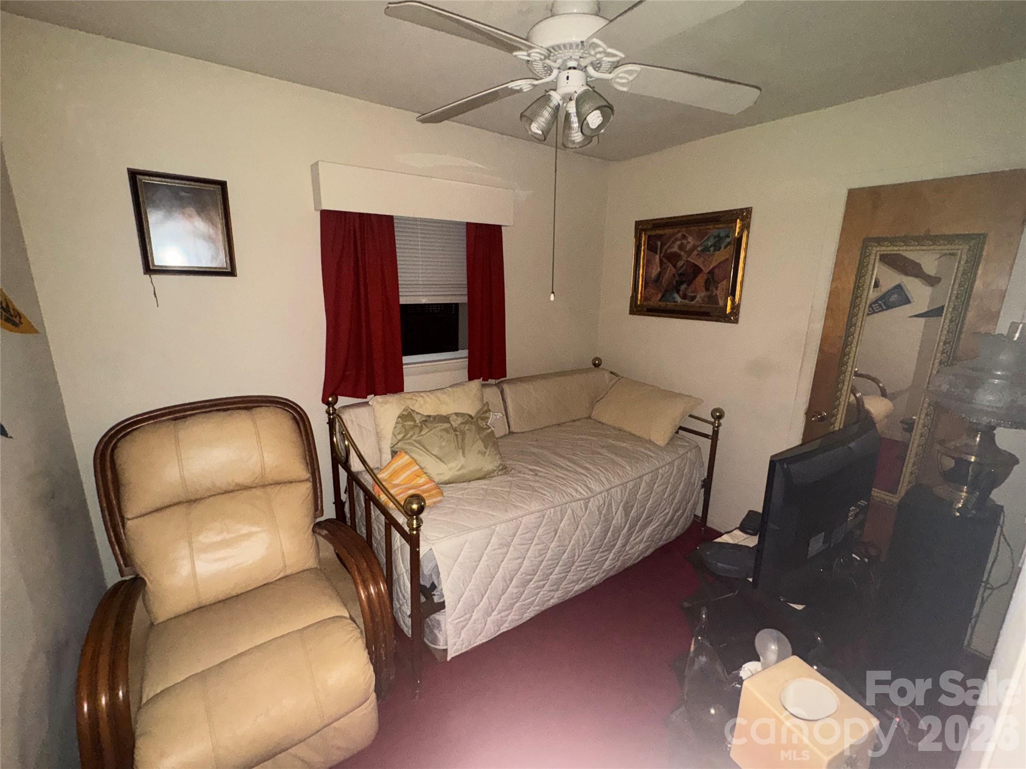 1529 West Market St Extension Cheraw, SC 29520 - Photo 18 of 38 a bedroom with a bed and dresser