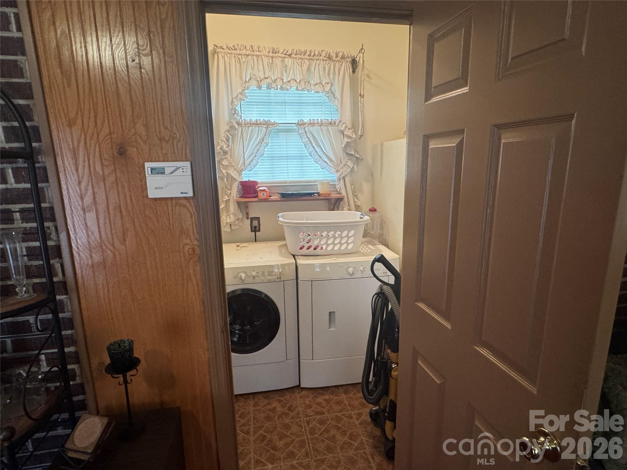 1529 West Market St Extension Cheraw, SC 29520 - Photo 35 of 38 a utility room with dryer and washer