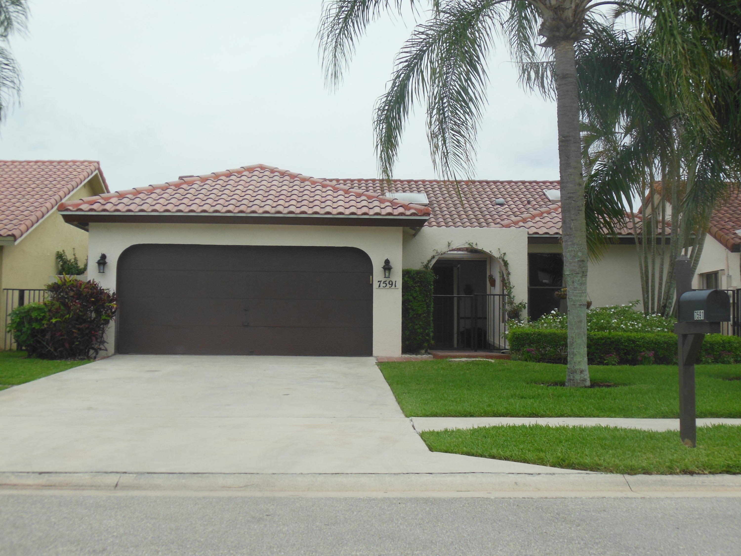 7591 Solimar Circle Boca Raton, FL 33433 - Photo 1 of 15 FRONT