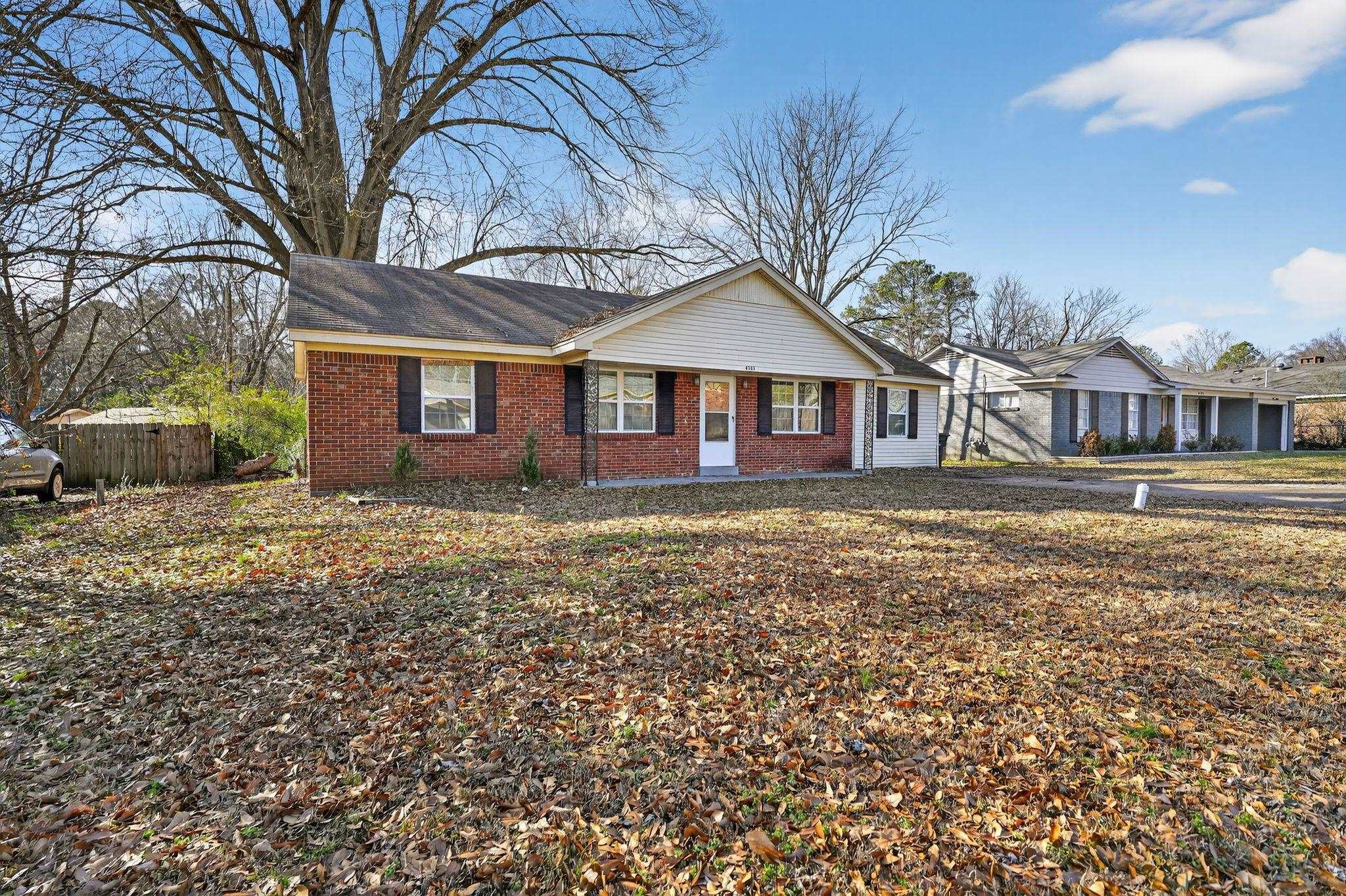 4285 Trudy Street Memphis, TN 38128 - Photo 2 of 31 Ranch-style home with brick siding and a porch