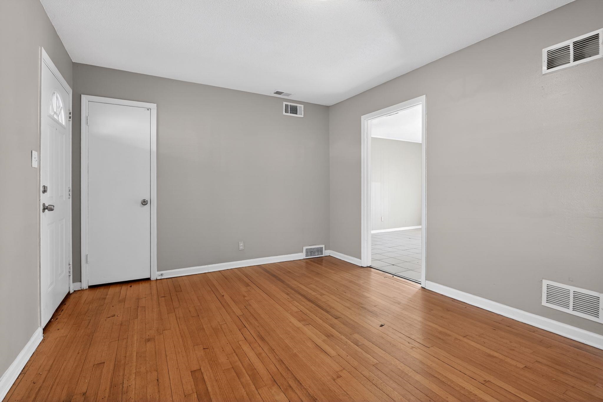 4285 Trudy Street Memphis, TN 38128 - Photo 6 of 31 Empty room featuring baseboards and light wood finished floors