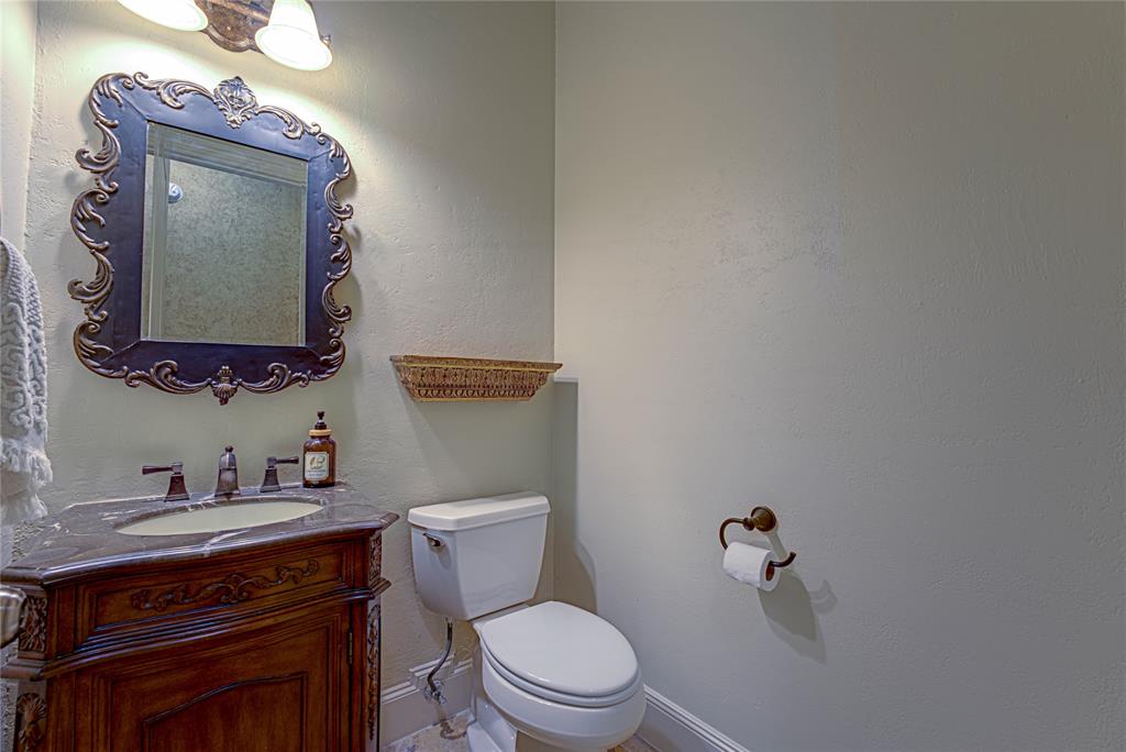242 Ridgemont Road Heath, TX 75126 - Photo 27 of 36 Downstairs powder bath