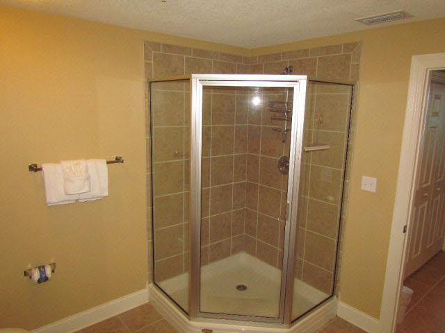 27800 Canal Road, Unit 309 Orange Beach, AL 36561 - Photo 19 of 33 tile shower