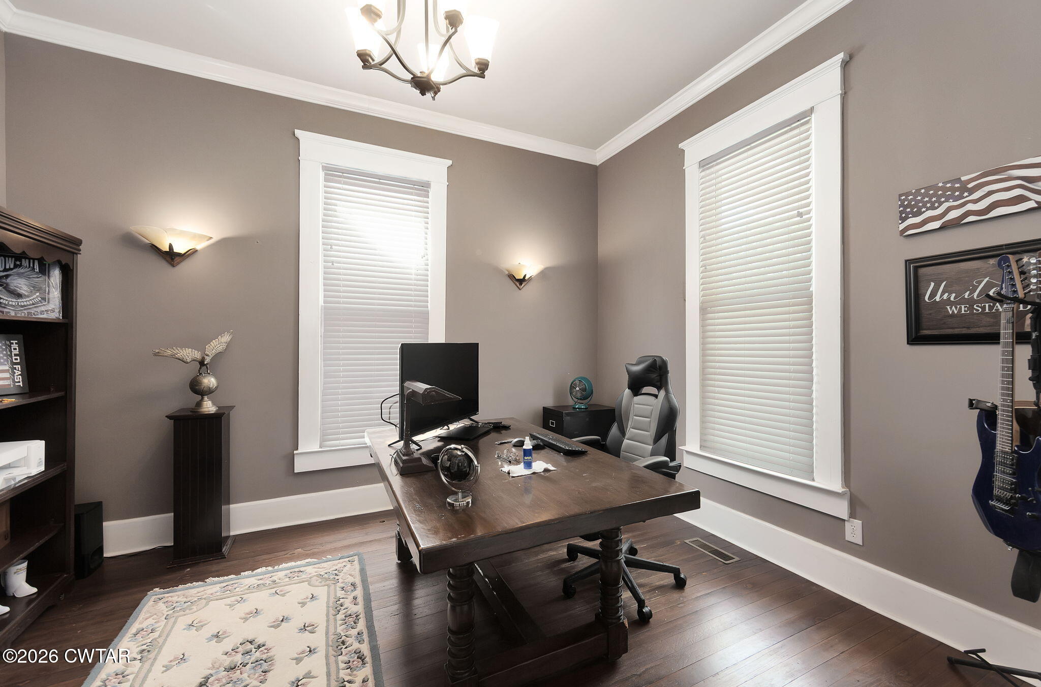554 East Main Street Jackson, TN 38301 - Photo 6 of 60 a view of a workspace with furniture and a window