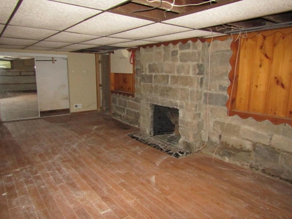 813 Coleman Drive Rochester, PA 15074 - Photo 33 of 33 a view of empty room with exposed radiator and dryer