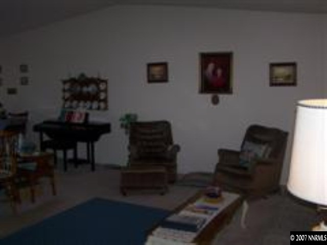 523 Yellow Jacket Road Dayton, NV 89403 - Photo 5 of 9 a living room with furniture and a piano