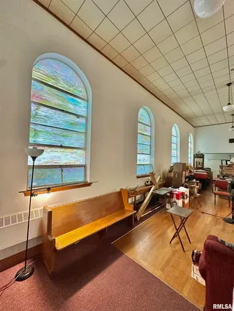 a living room with furniture and a window