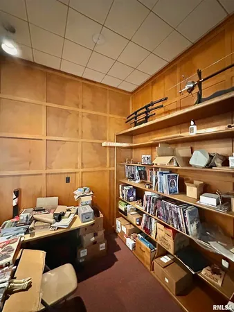 a bathroom with a sink toilet and mirror
