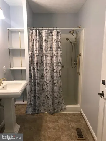 a view of a room that has a window in it