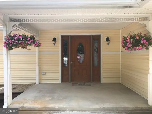 a view of a house with a big yard
