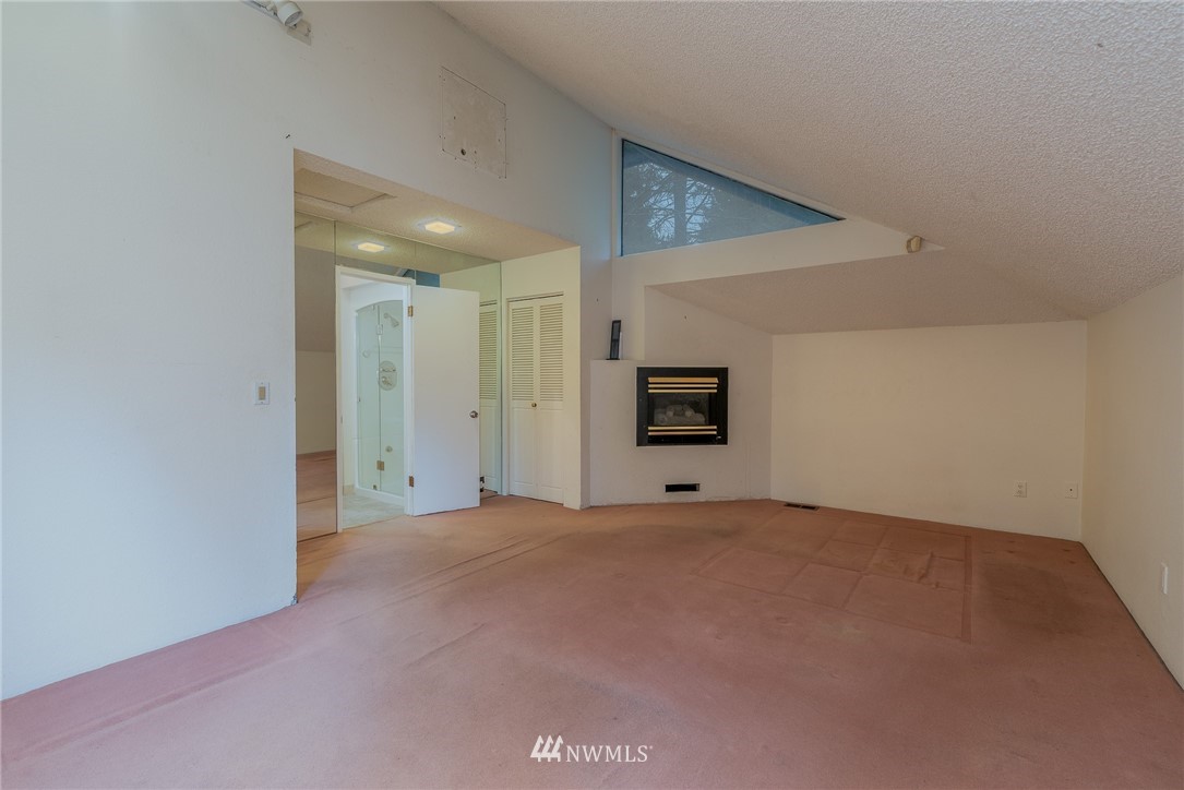 2254 Cedar Point Avenue Point Roberts, WA 98281 - Photo 16 of 39 a view of an empty room with a kitchen